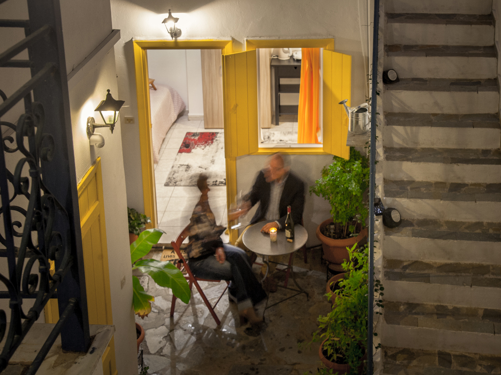 Cozy outdoor seating area for enjoying drinks and meals in Perfect studio yard