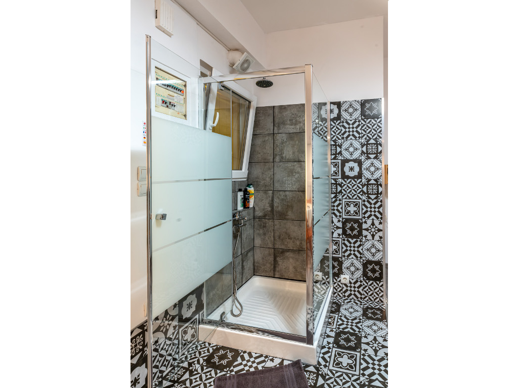 Modern shower installation with glass enclosure in Perfect studio